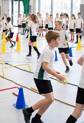 Children training in a sports hall